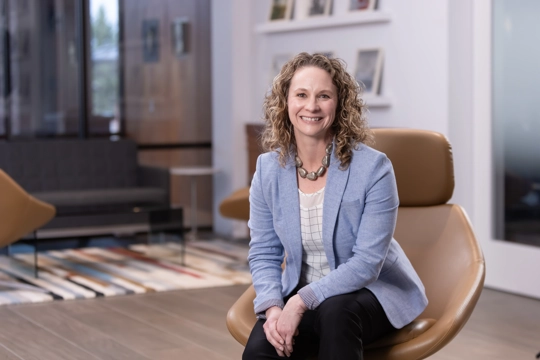 portrait of a smiling person in professional attire